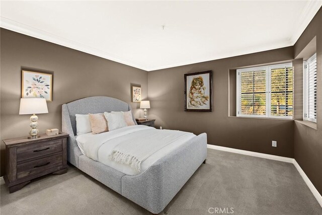 bedroom with light colored carpet