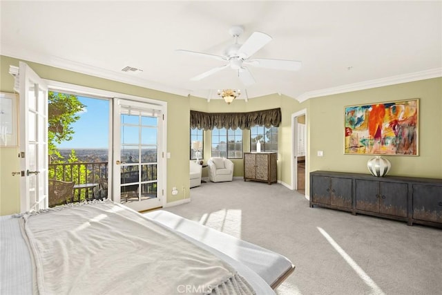 carpeted bedroom featuring ceiling fan, access to exterior, and ornamental molding