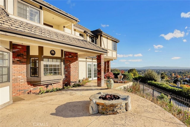 view of patio featuring a fire pit