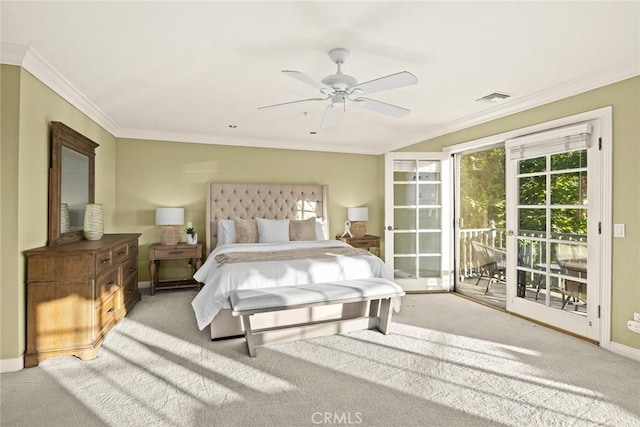 carpeted bedroom featuring ceiling fan, access to outside, and crown molding