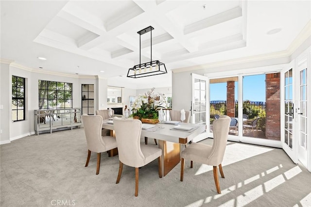 carpeted dining space featuring beam ceiling, french doors, crown molding, and coffered ceiling