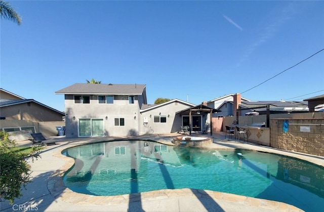 view of swimming pool featuring a patio