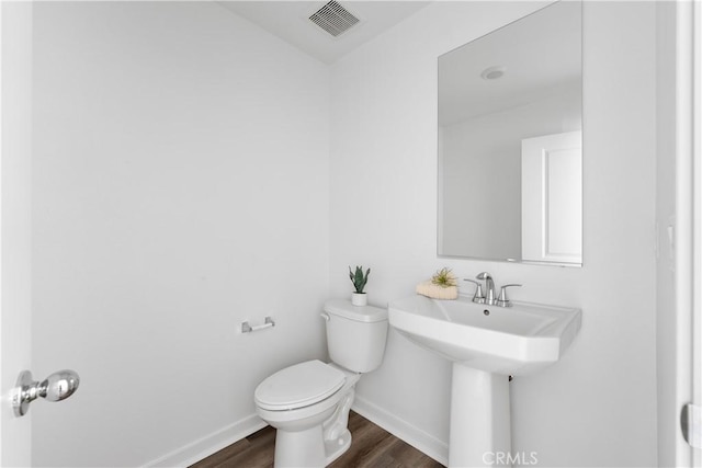 9431 N Sepulveda Blvd Unit 3, North Hills, CA 91343 - bathroom featuring wood finished floors and toilet