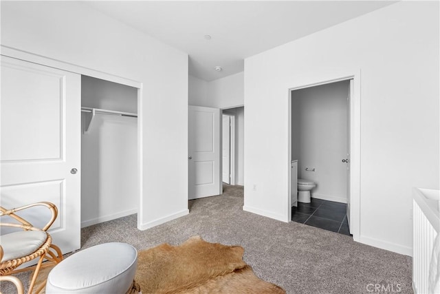9431 N Sepulveda Blvd Unit 3, North Hills, CA 91343 - bathroom featuring toilet and baseboards