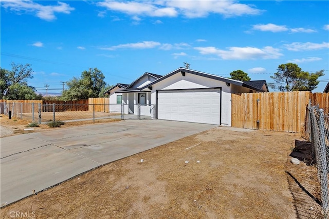 single story home with a garage