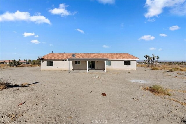 back of house featuring a patio area