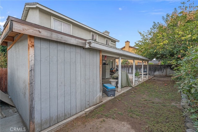 view of home's exterior with a patio