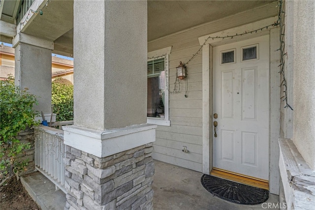 property entrance with a porch