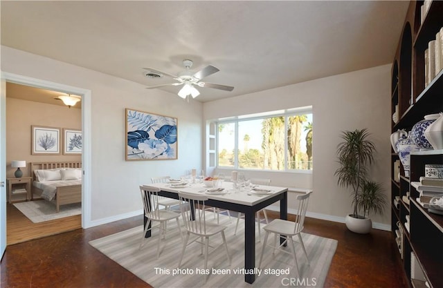 dining space featuring ceiling fan