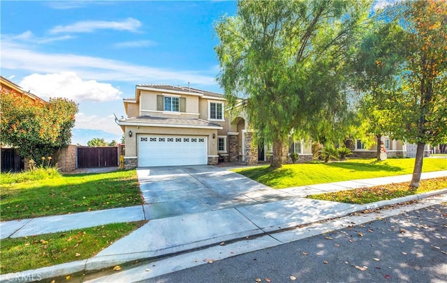 view of front of house with a garage and a front yard