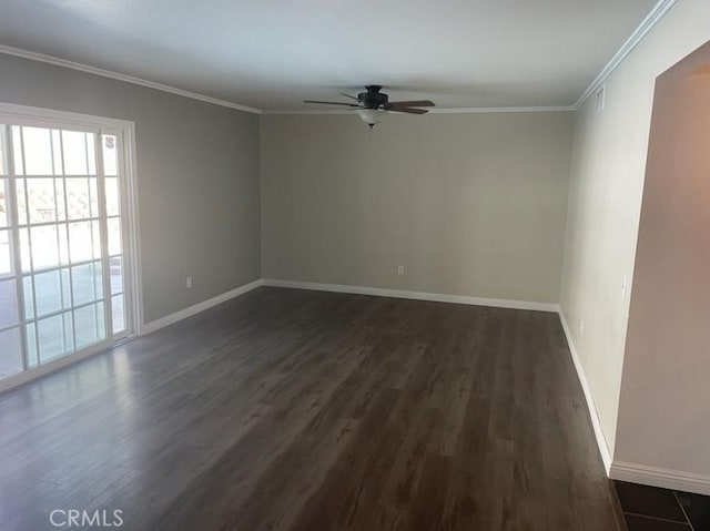 unfurnished room with ceiling fan, dark hardwood / wood-style flooring, and ornamental molding