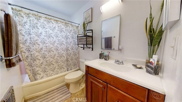 full bathroom featuring tile patterned floors, vanity, shower / bath combination with curtain, and toilet