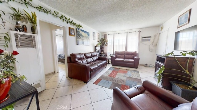 tiled living room with a textured ceiling and an AC wall unit