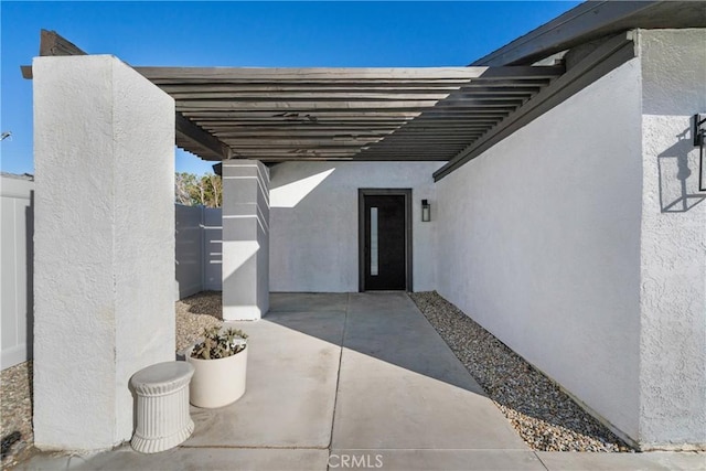 view of patio featuring a carport