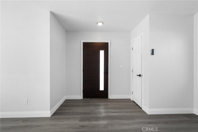 foyer featuring dark hardwood / wood-style floors