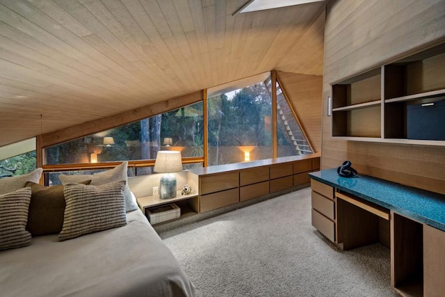 bedroom featuring light colored carpet, wood ceiling, and lofted ceiling