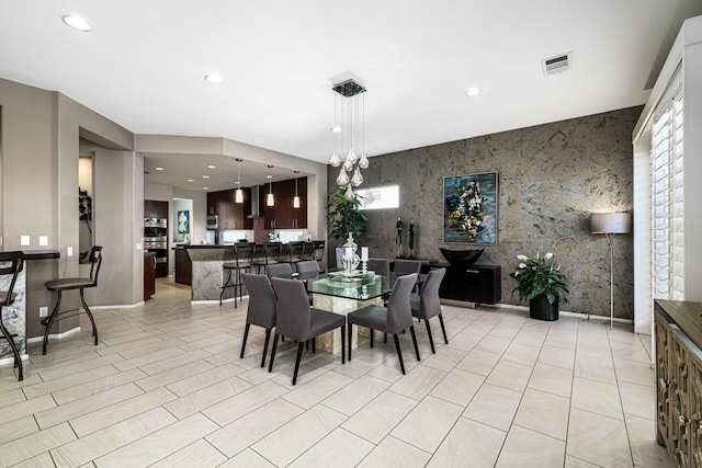 dining area with plenty of natural light