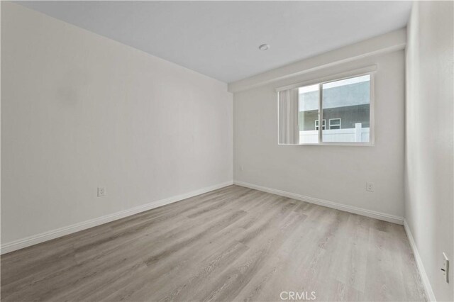 empty room featuring light hardwood / wood-style floors