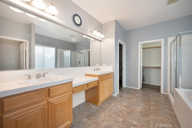 bathroom with vanity and plus walk in shower