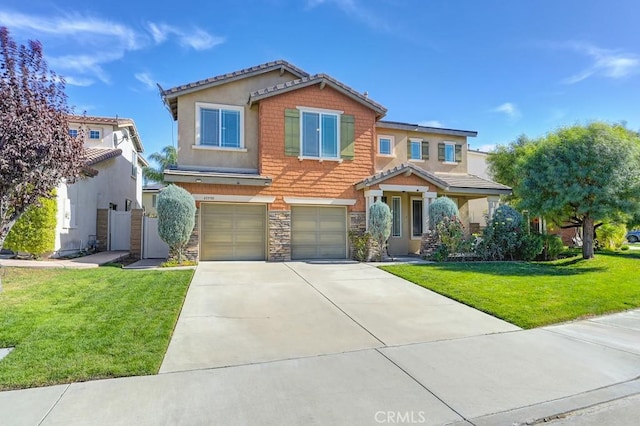 view of front of home featuring a garage and a front lawn