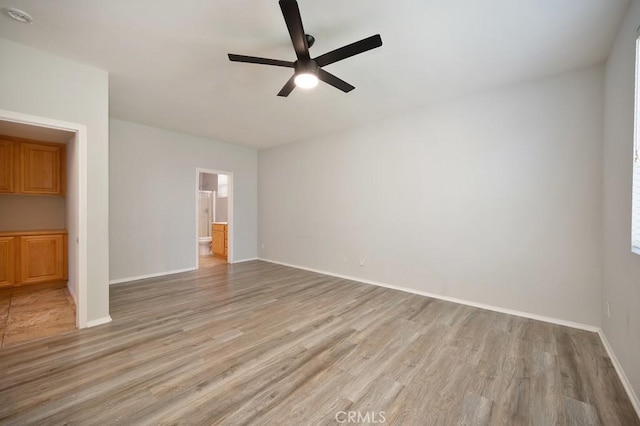 unfurnished living room with light hardwood / wood-style floors and ceiling fan