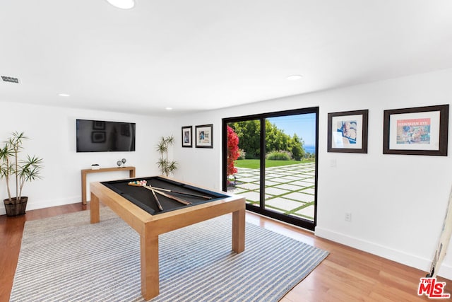 rec room with billiards and light wood-type flooring