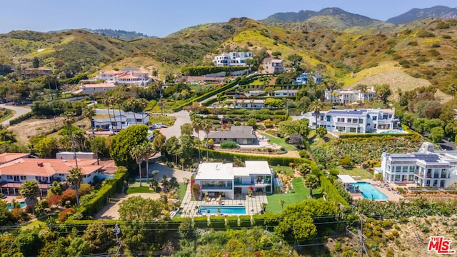 aerial view featuring a mountain view