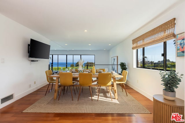 dining area featuring hardwood / wood-style flooring