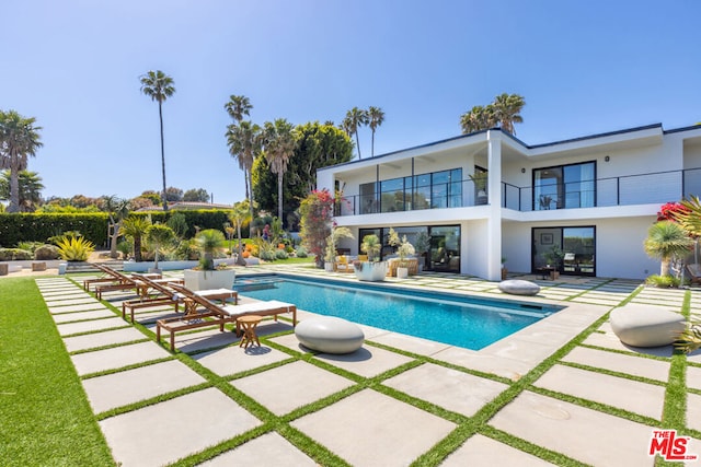 view of pool with a patio area