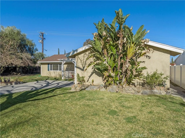 exterior space with a yard