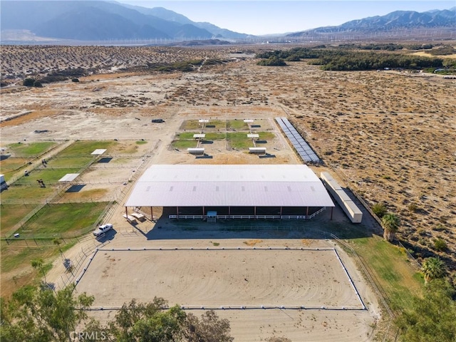 drone / aerial view featuring a mountain view