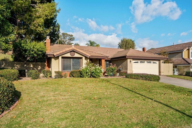 single story home with a front lawn and a garage