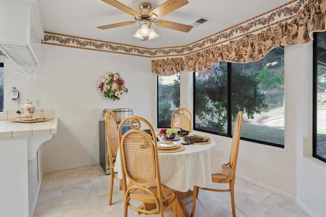 dining area featuring ceiling fan