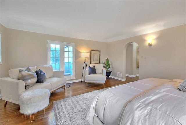 bedroom featuring wood-type flooring