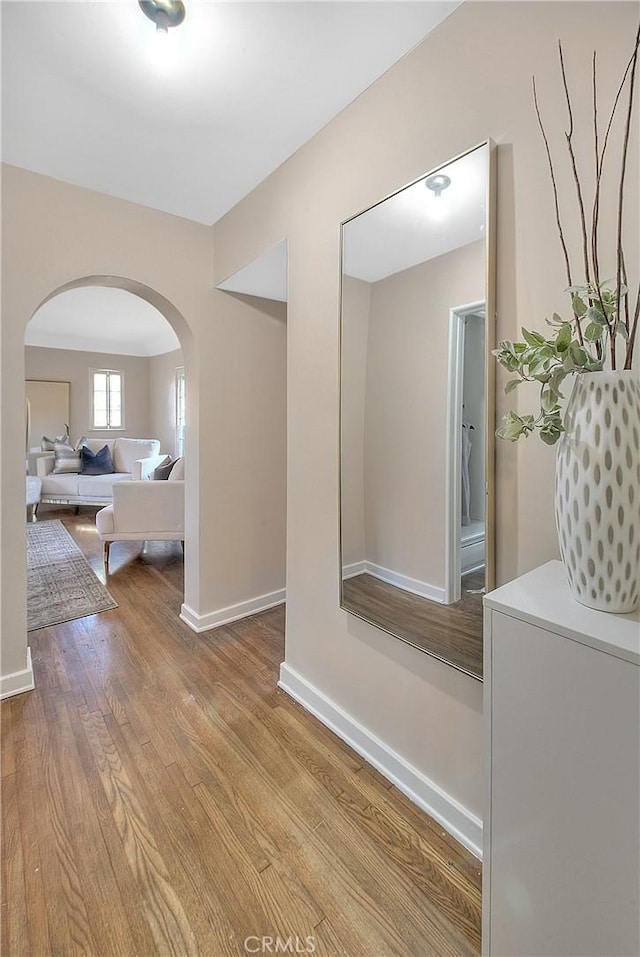 hall with light wood-type flooring