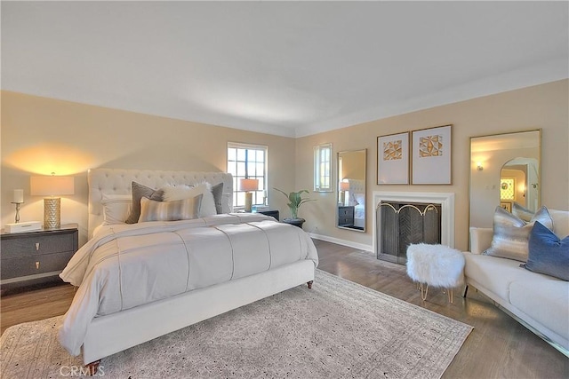 bedroom featuring dark wood-type flooring