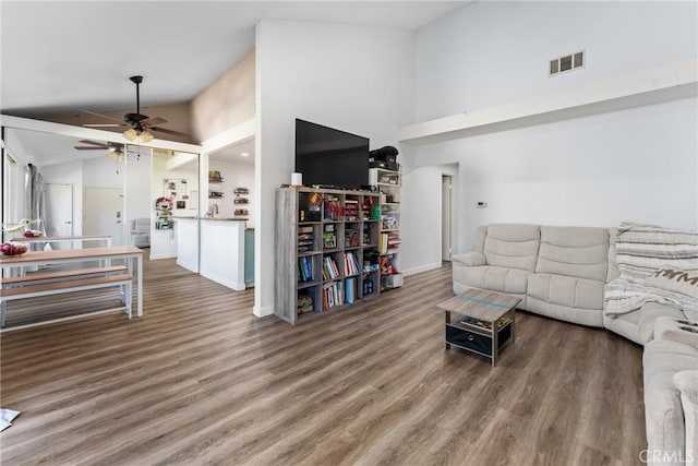 16040 Leffingwell Rd Unit 92, Whittier, CA 90603 - living area featuring a ceiling fan, high vaulted ceiling, wood finished floors, and baseboards