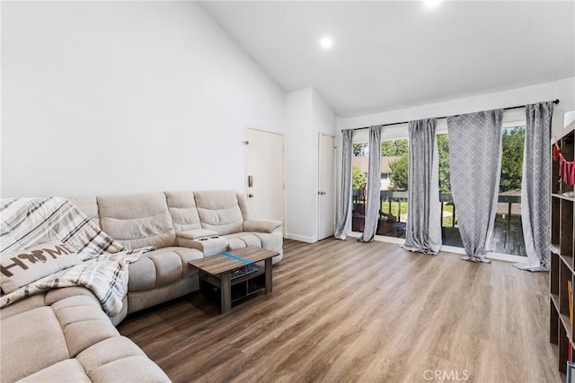 16040 Leffingwell Rd Unit 92, Whittier, CA 90603 - living area featuring high vaulted ceiling, baseboards, wood finished floors, and recessed lighting
