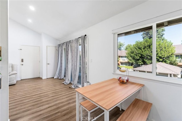 16040 Leffingwell Rd Unit 92, Whittier, CA 90603 - dining room with healthy amount of natural light, wood finished floors, lofted ceiling, recessed lighting, and baseboards