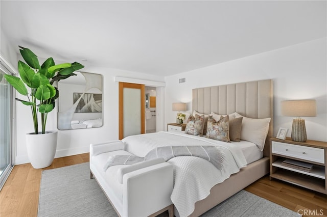 bedroom featuring hardwood / wood-style floors