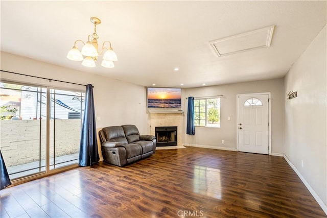 interior space with dark hardwood / wood-style flooring and an inviting chandelier