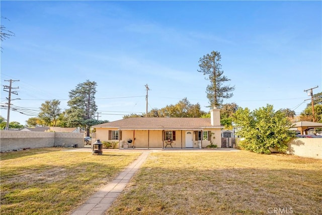 view of front of home with a front yard