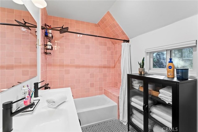 bathroom with sink and shower / tub combo