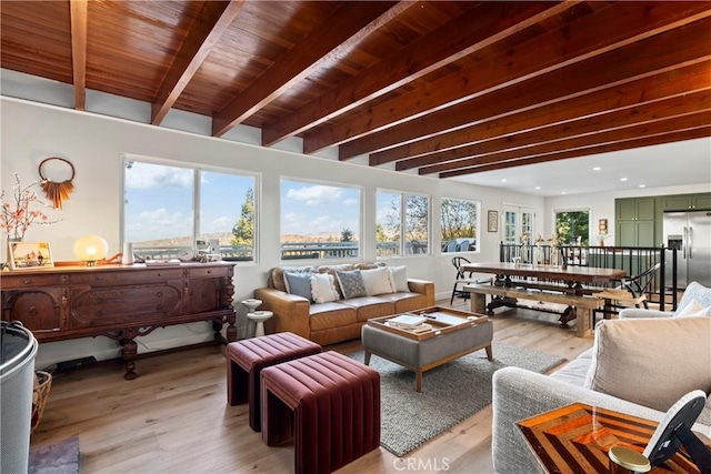 interior space featuring beamed ceiling and wooden ceiling