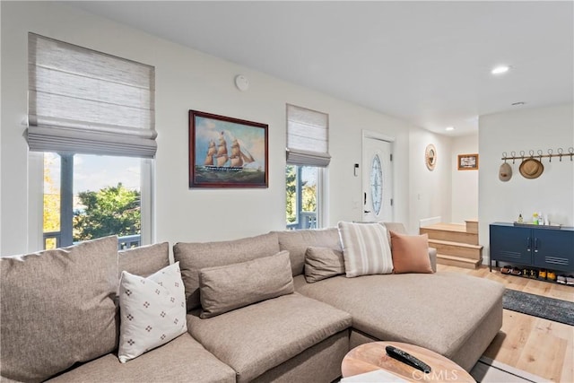 living room with light hardwood / wood-style flooring