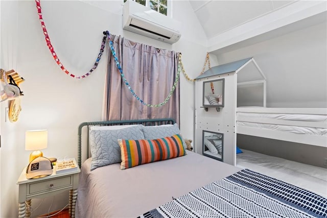 bedroom with a wall mounted air conditioner and vaulted ceiling