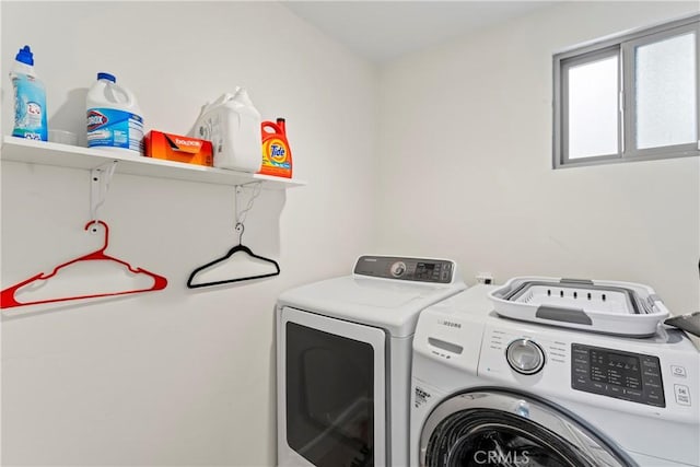 laundry room featuring independent washer and dryer