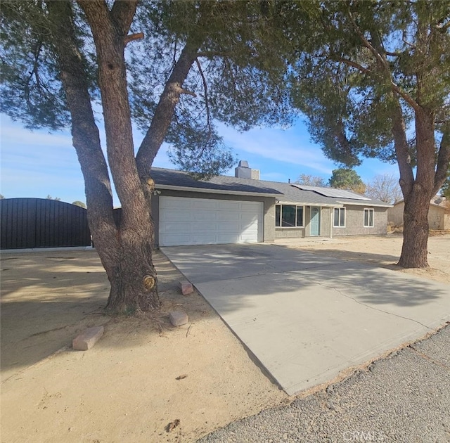 ranch-style home with a garage