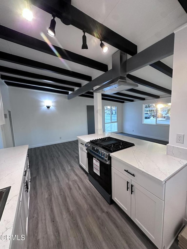 kitchen featuring white cabinetry, dark wood-type flooring, light stone counters, beamed ceiling, and black range with gas cooktop