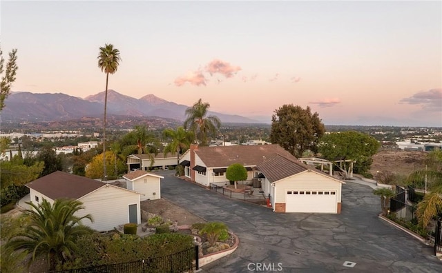 aerial view at dusk with a mountain view